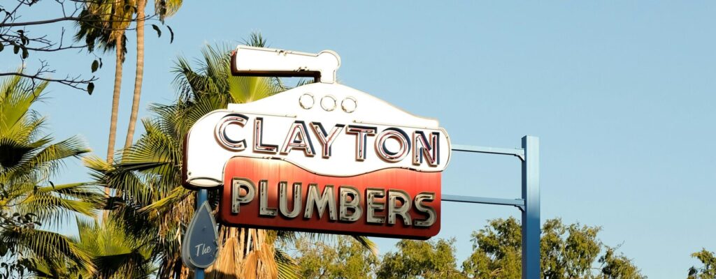 vintage company sign for a local plumber