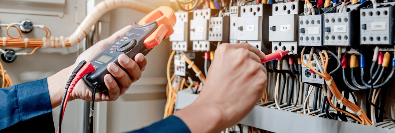 electrician testing an electric panel