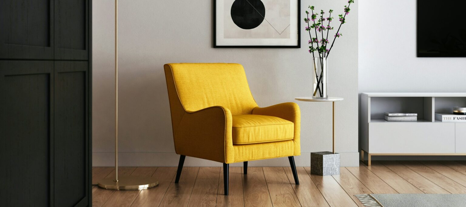 Beautifully designed room with hardwood plank flooring and a bright yellow chair